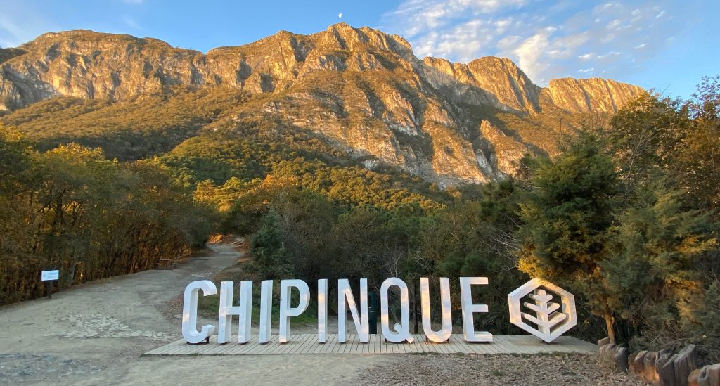 White Chipinque Letters at Puerto Del Aire with the mountain in the background in morning light.